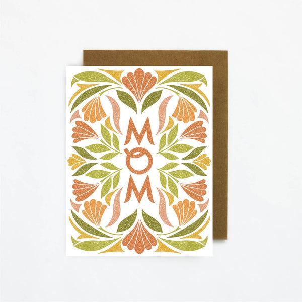 Outside of card reads "Mom" surrounded by a spring inspired pattern